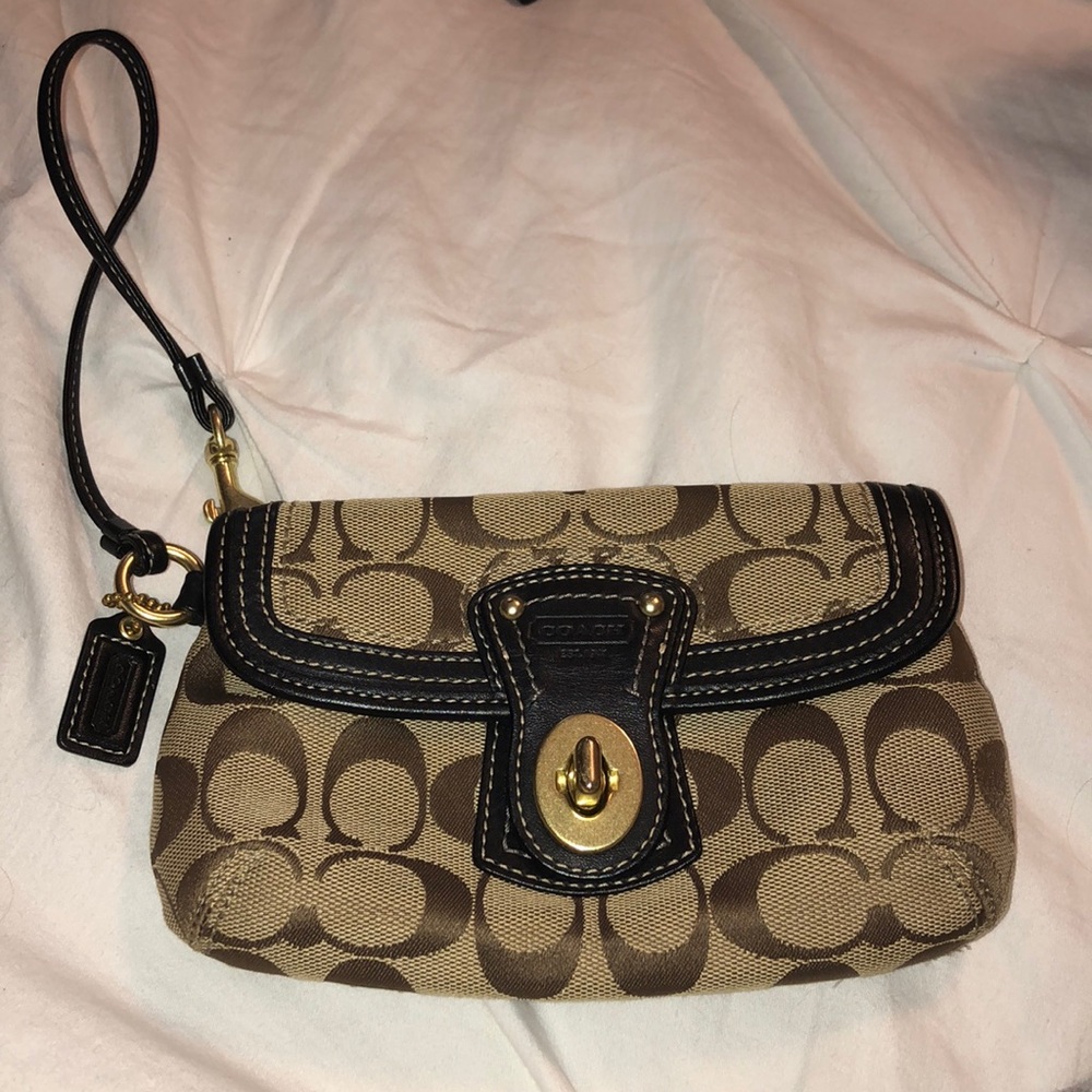Coach wallet zipper wristlet. Color: Brown, Tan